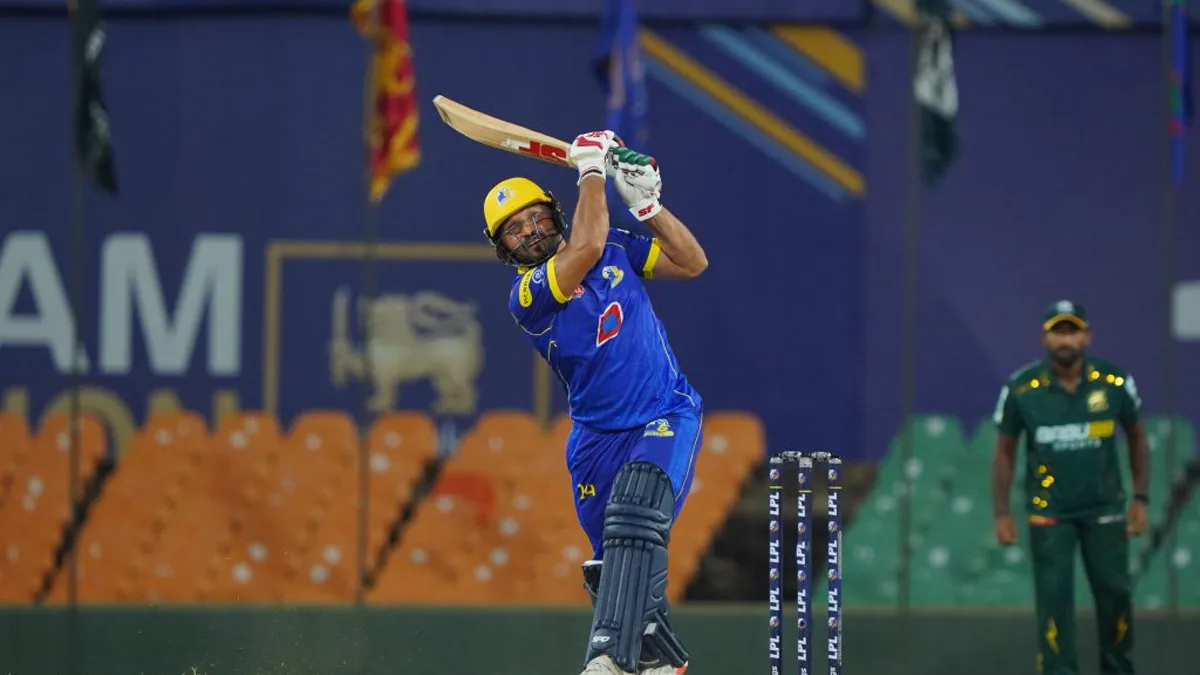 A batter playing a shot during a cricket match. USA League 2 Title 2026