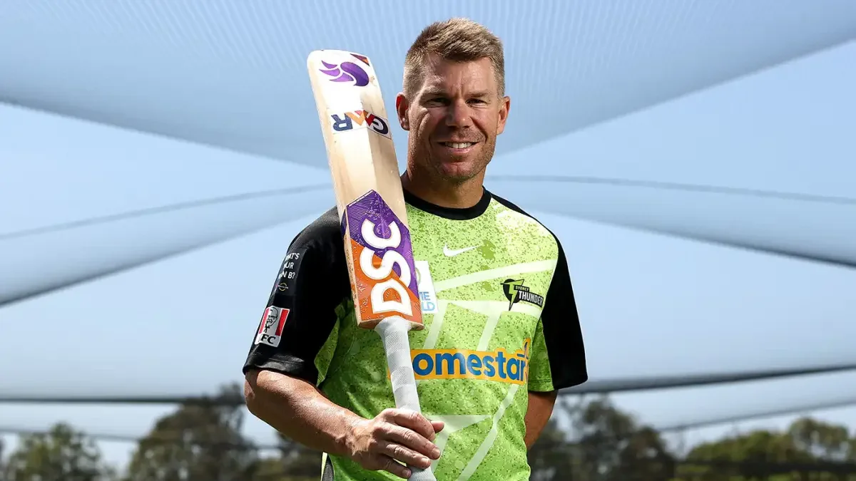 David Warner poses in the Sydney Thunder kit ahead of the Sydney Thunder vs Sydney Sixers head to head derbies