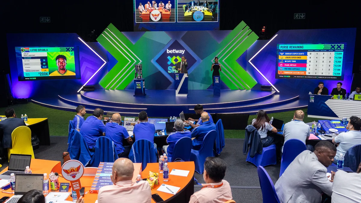 Jason Rowles SA20 auction - SA20 player auction room in Johannesburg with franchise tables and the purse board