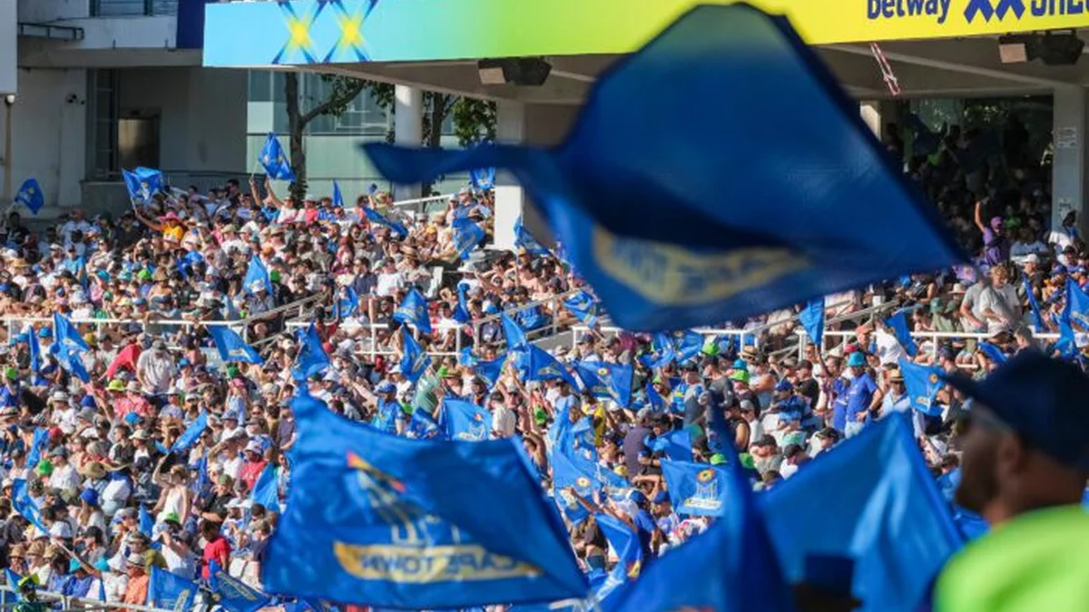 SA20 economic impact R6.5 billion - SA20 fans waving team flags in the stands at Newlands